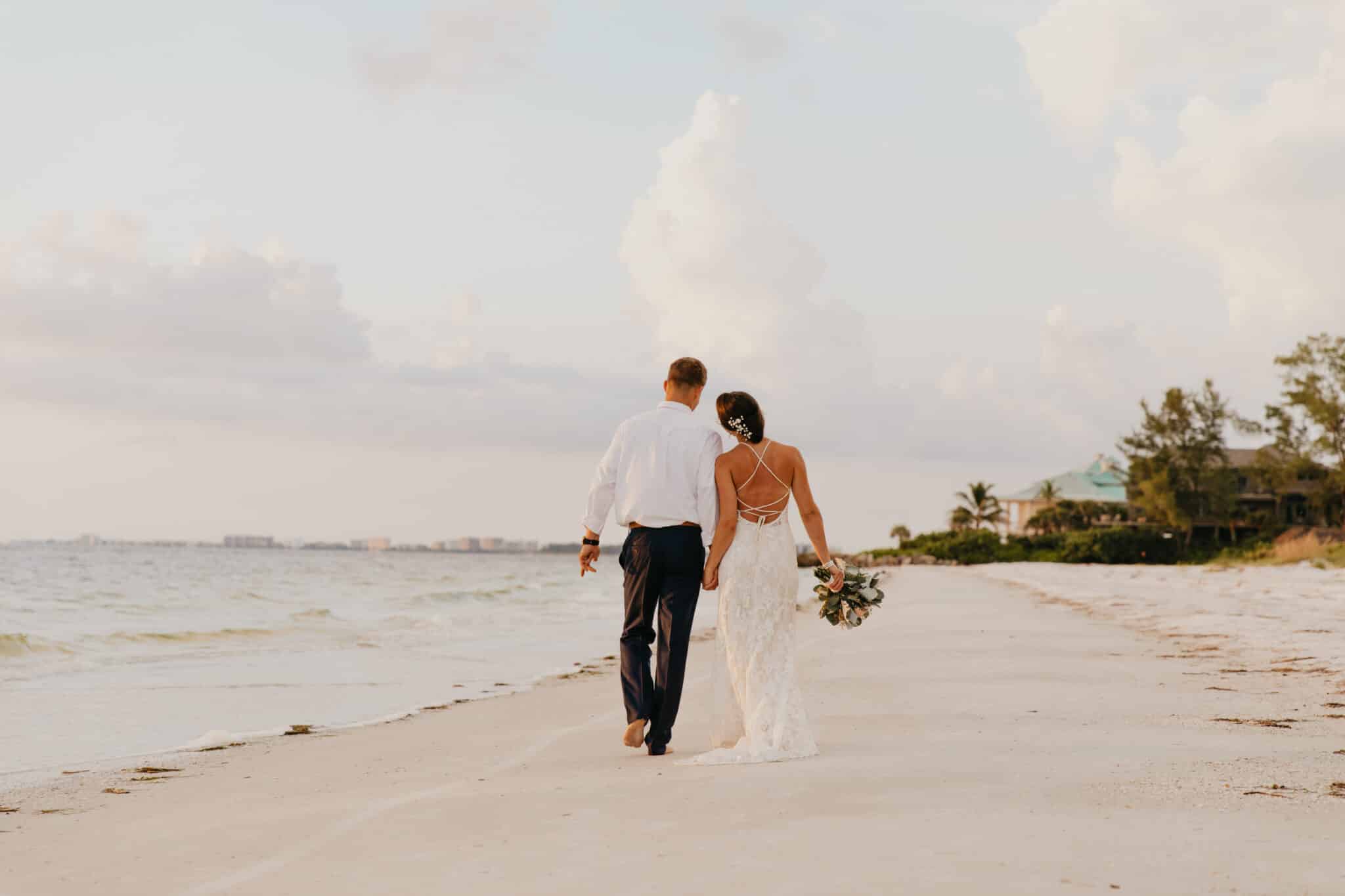destination wedding videography bride and groom on beach