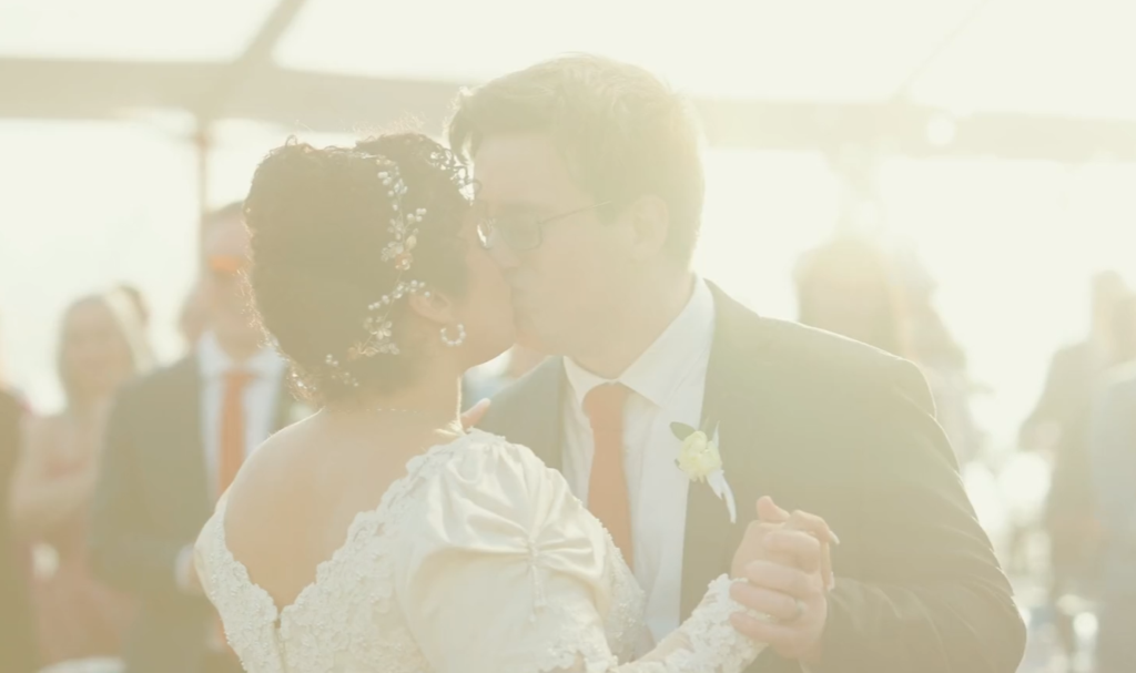 Humblebee Wedding Films The Nonantum Resort Kennebunkport Maine, newlyweds share a kiss during first dance