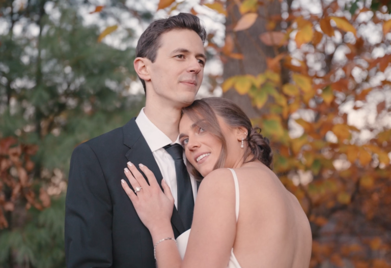 Humblebee Wedding Films The Riverview, newlyweds embrace and pose for a picture