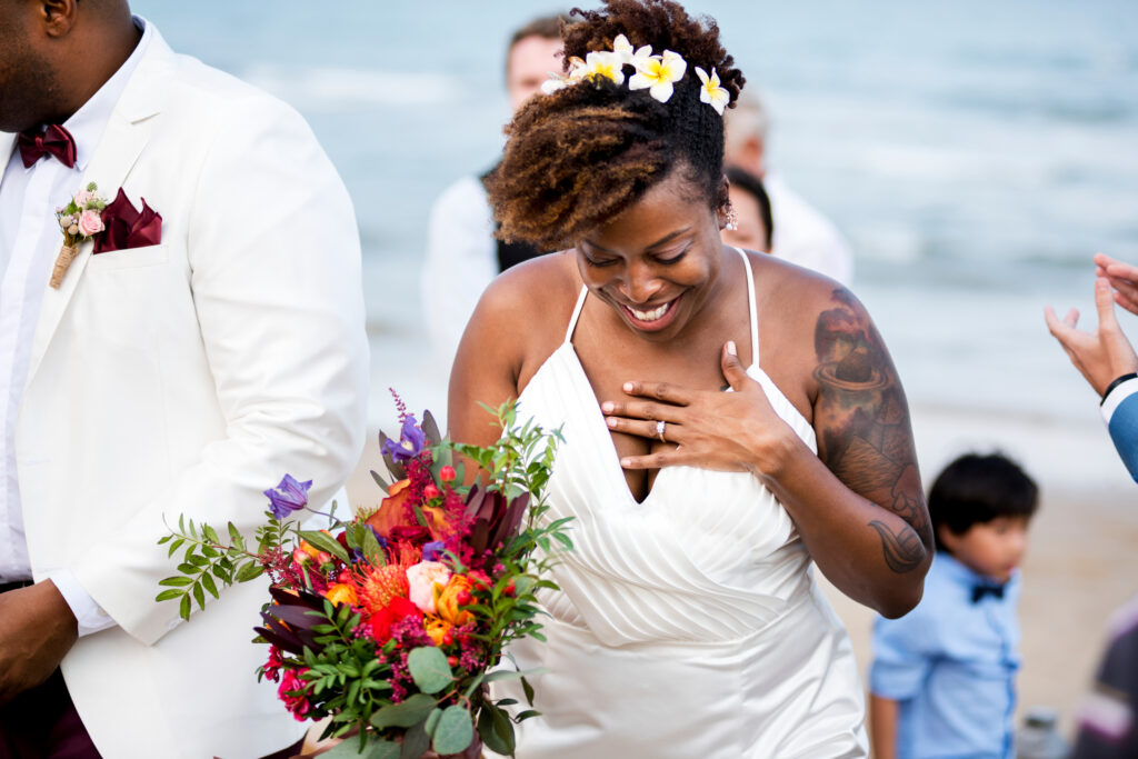 Humblebee Wedding Films Destination Wedding Videographer, Happy bride and groom in a wedding ceremony at a tropical island