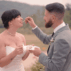 Humblebee Wedding Videography Cold Spring Farm, groom feeds bride cake with farmland behind them